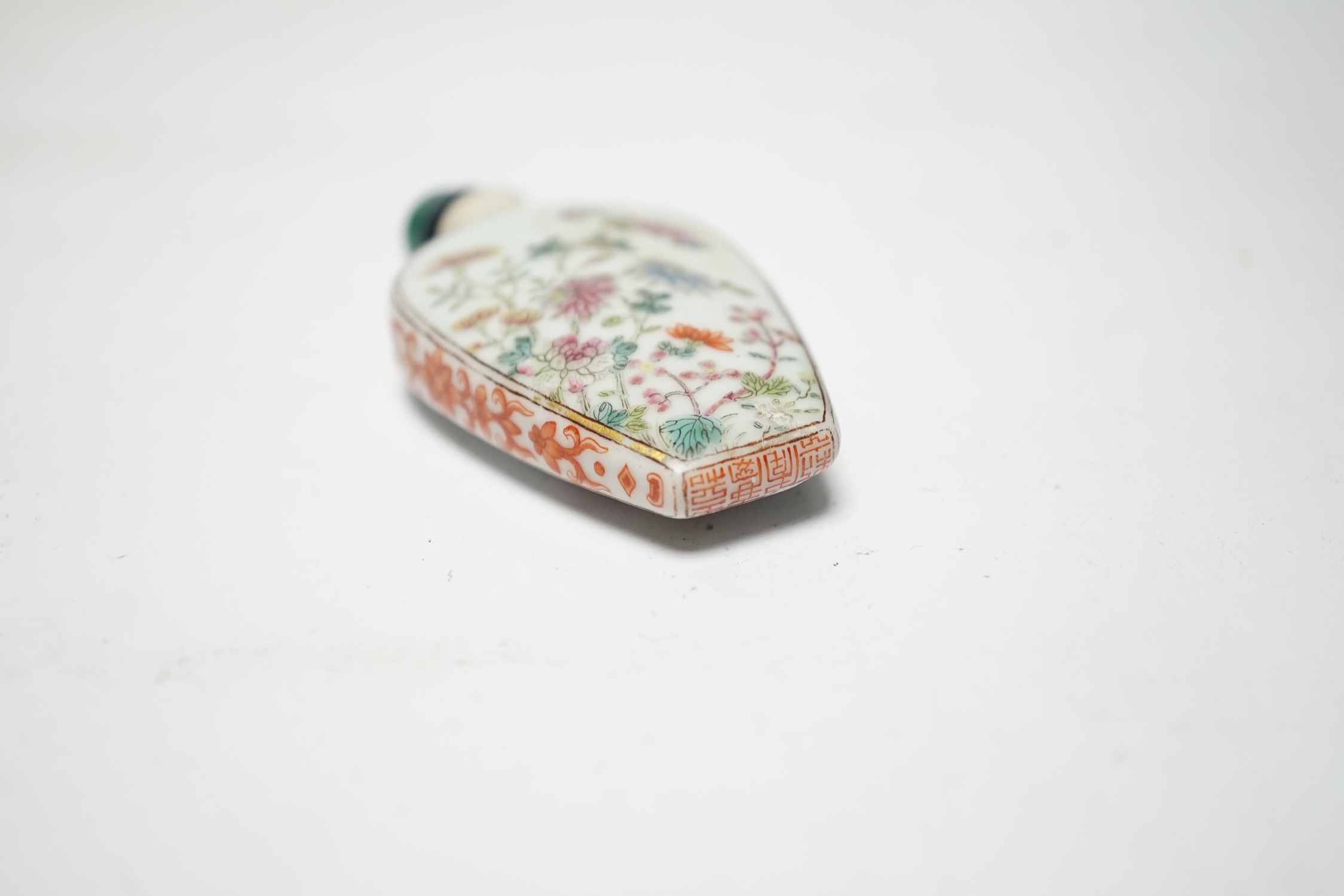 A Chinese famille rose snuff bottle, Jiaqing mark and of the period (1796-1820), rim ground off, 7cm high